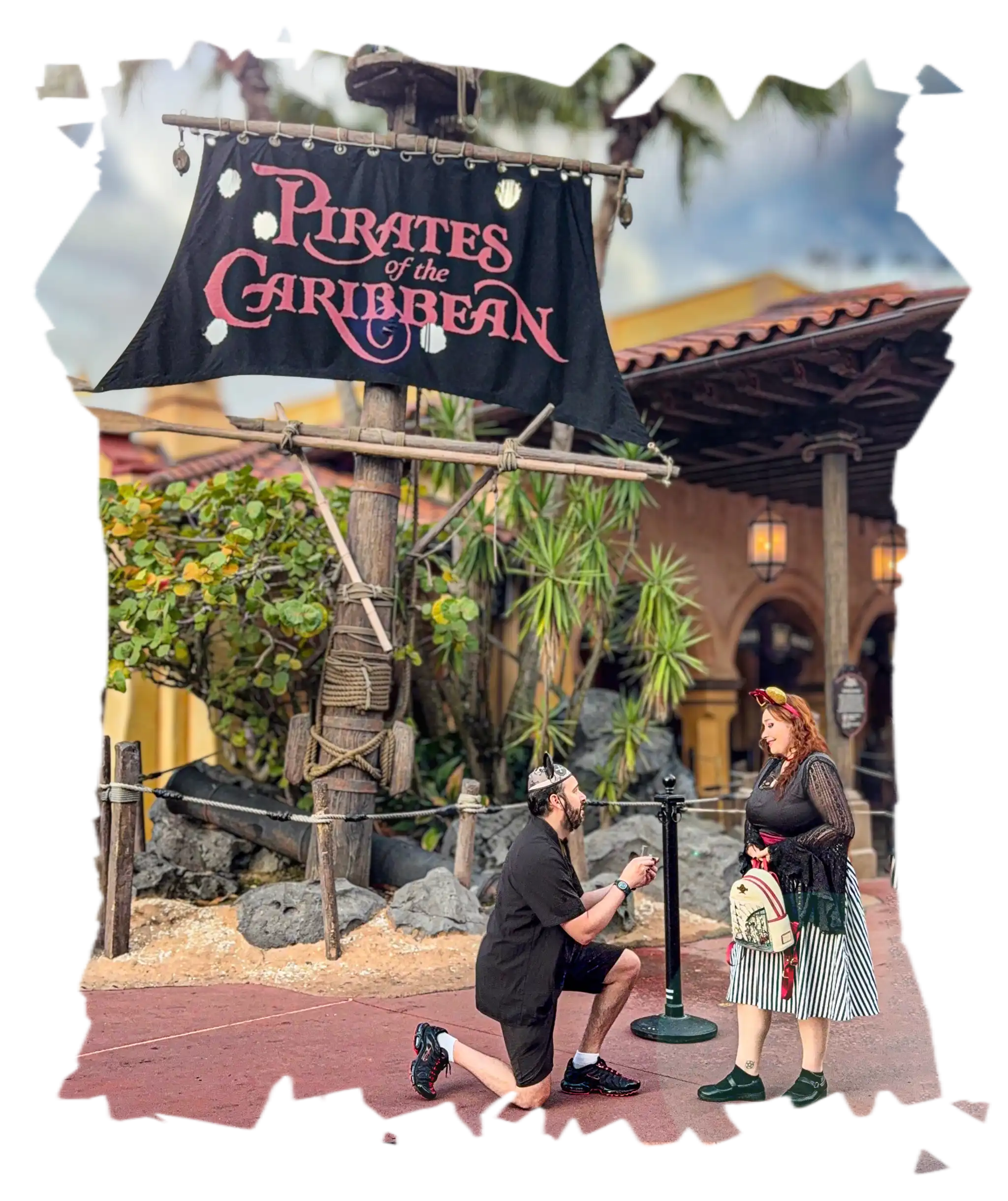 Me proposing to his fiancée Alice in front of the Pirates of the Caribbean entrance at Disneyworld